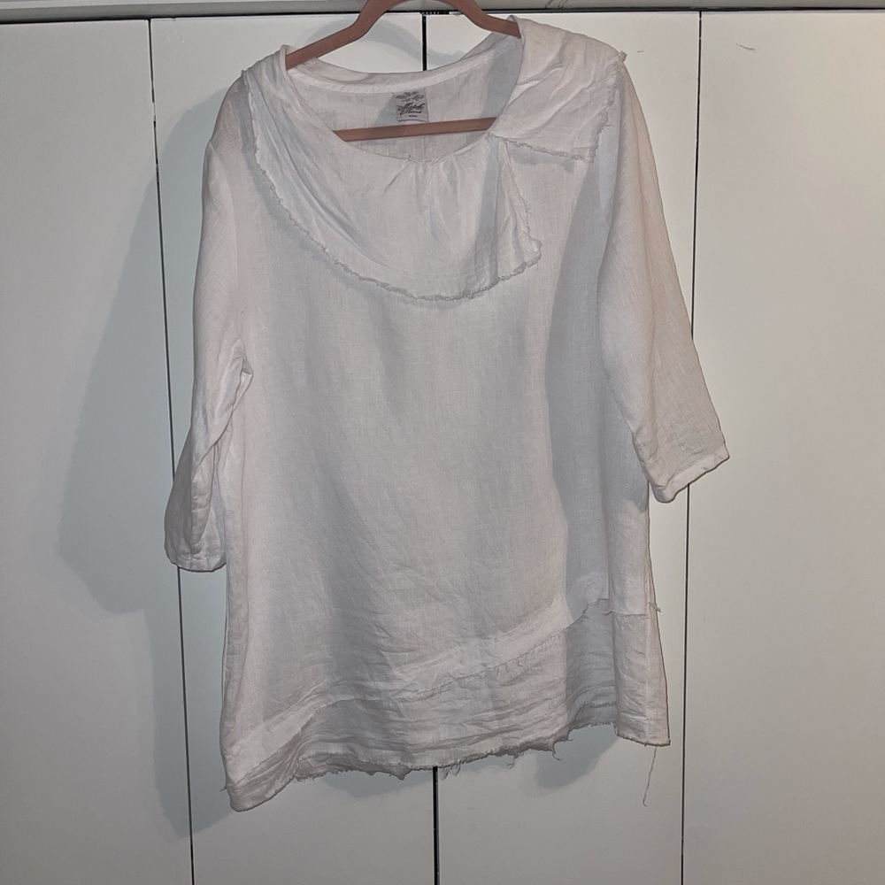 Match Point white linen blouse.